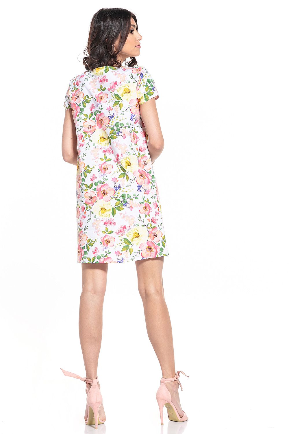 Close-up of Tessita's luxury mini dress, highlighting the boat neckline and high-quality cotton fabric.