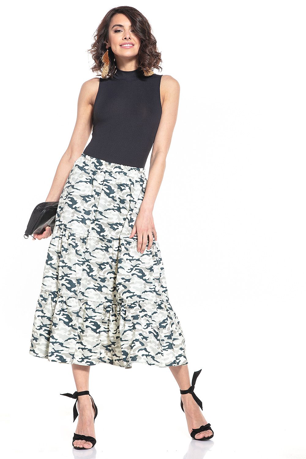 Model wearing the Tessita Dark Moro Pattern Long Cotton Skirt in a stylish urban setting, epitomising luxury fashion.