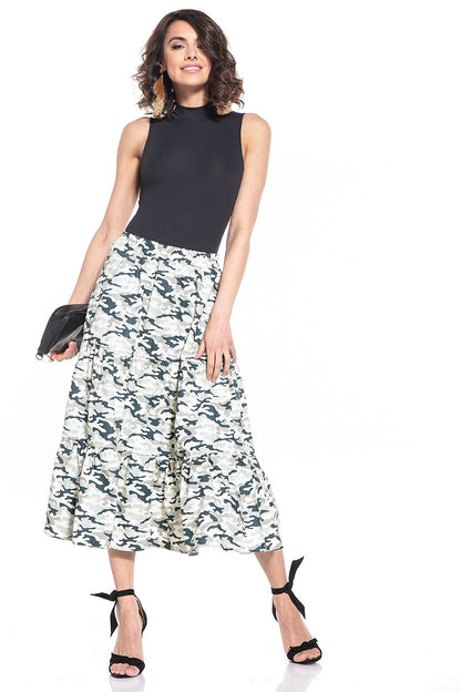 Model wearing the Tessita Dark Moro Pattern Long Cotton Skirt in a stylish urban setting, epitomising luxury fashion.