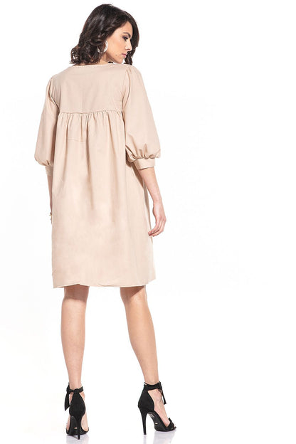 Luxury Tessita midi dress featuring a scoop neckline and 3/4-length sleeves, elegantly designed from 100% cotton.