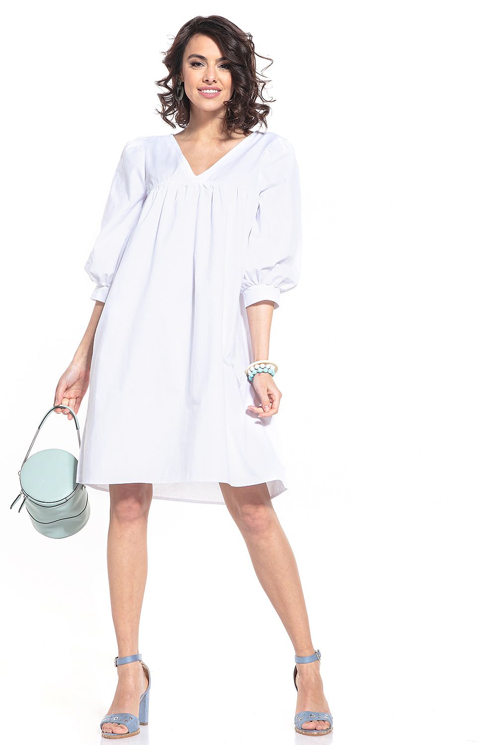 Stylish Tessita midi dress with 3/4-length buffet sleeves, perfect for any elegant occasion, made from 100% cotton.