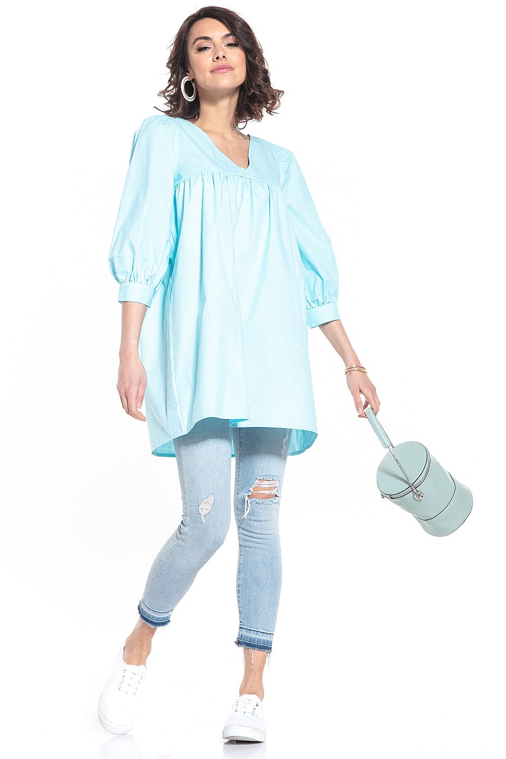 Elegant pointed neckline tunic by Tessita, showcasing luxurious 100% cotton fabric and stylish 3/4 length sleeves.