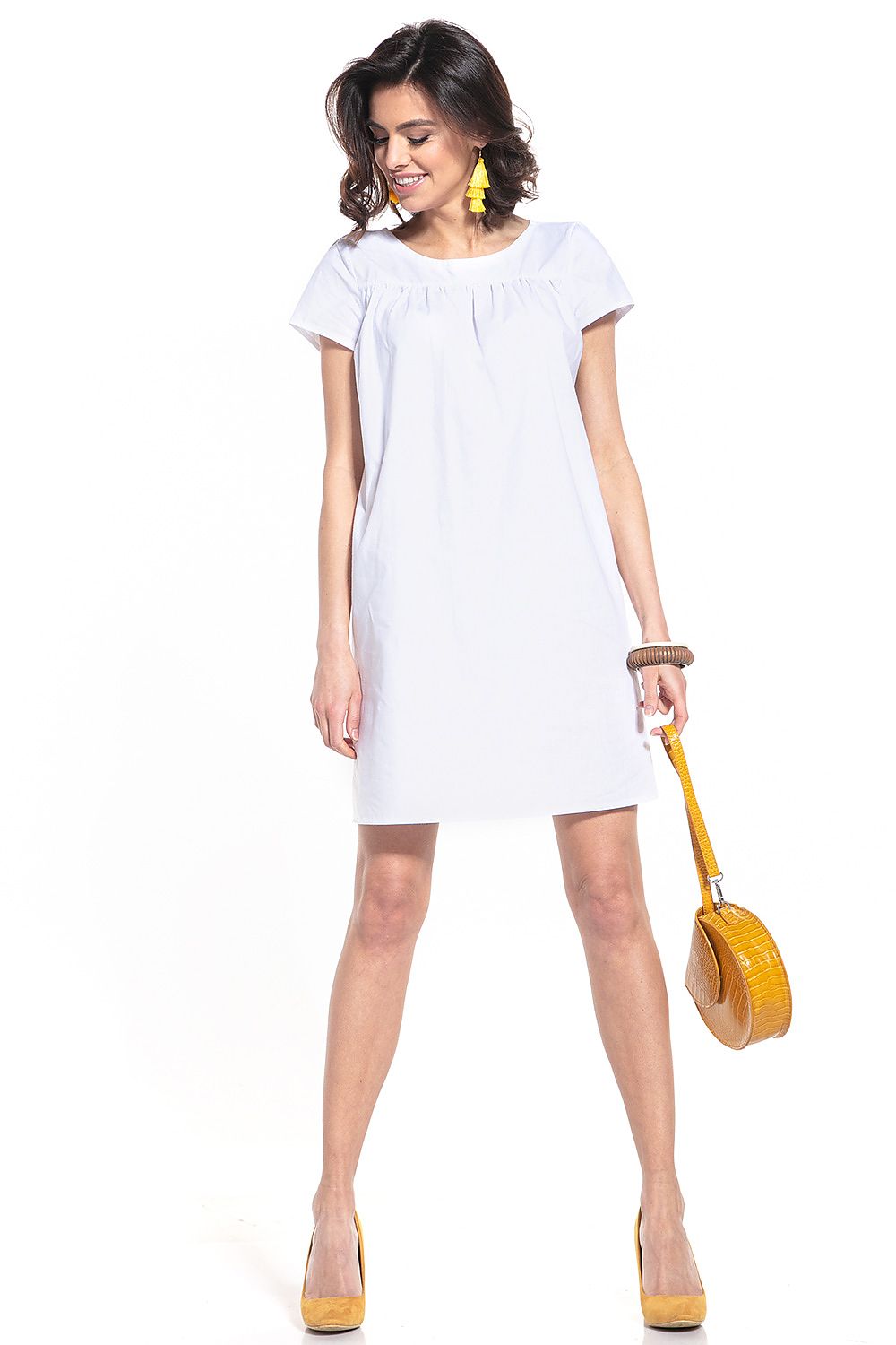 Elegant cotton mini dress with boat neckline and short sleeves by Tessita, showcasing a sophisticated design for timeless style.