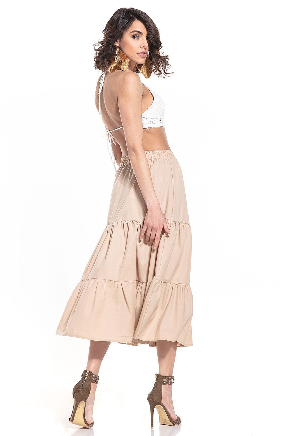 Close-up of Tessita's long skirt showcasing the soft, breathable cotton fabric and sleek elastic waistband.