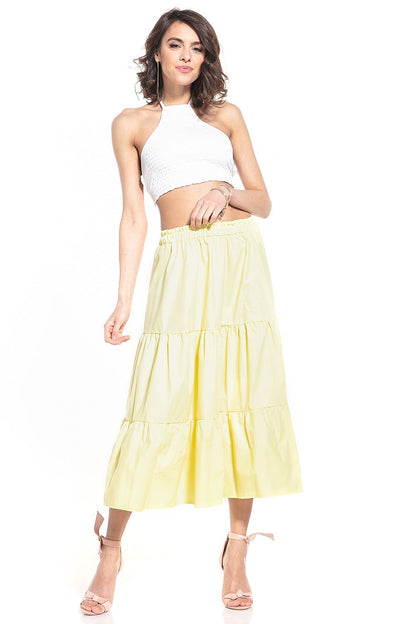 Tessita's airy cotton skirt perfect for summer wear, featuring an elastic waistband for a flattering fit.