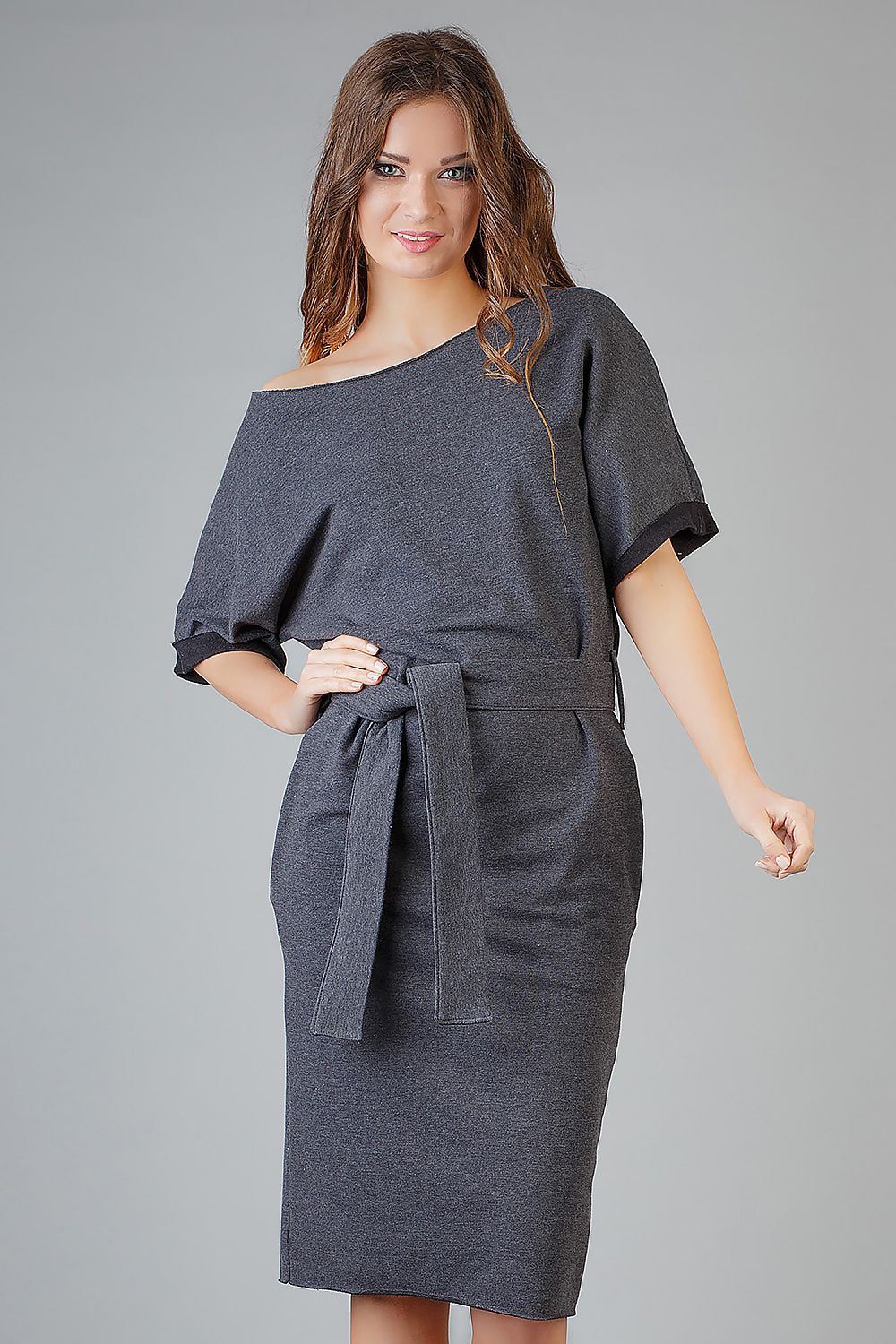 Luxurious Tessita Daydress showcasing an elegant loose-fitting kimono design with decorative cuffs and pockets, perfect for sophisticated summer styles.