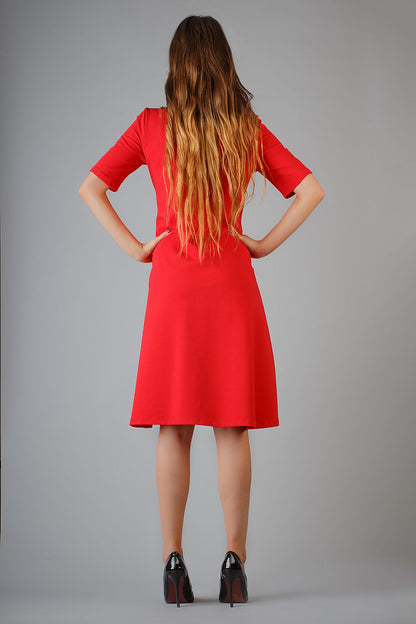 The Elegant Tessita Flared Knit Dress modelled to highlight the French cut and flared design, ideal for size EU S to XXXL.