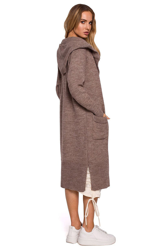 Back view of the luxurious long cardigan by Moe, showcasing its fitted hood and elegant side slits, styled in a comfortable taupe shade.