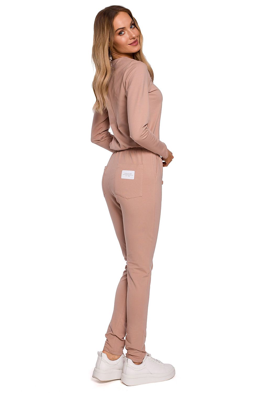 Back view of the Elegant Women's Fitted One-Piece Jumpsuit By Moe, featuring a sophisticated pink colour, adjustable waistband, and logo patch, ideal for a luxurious outfit.