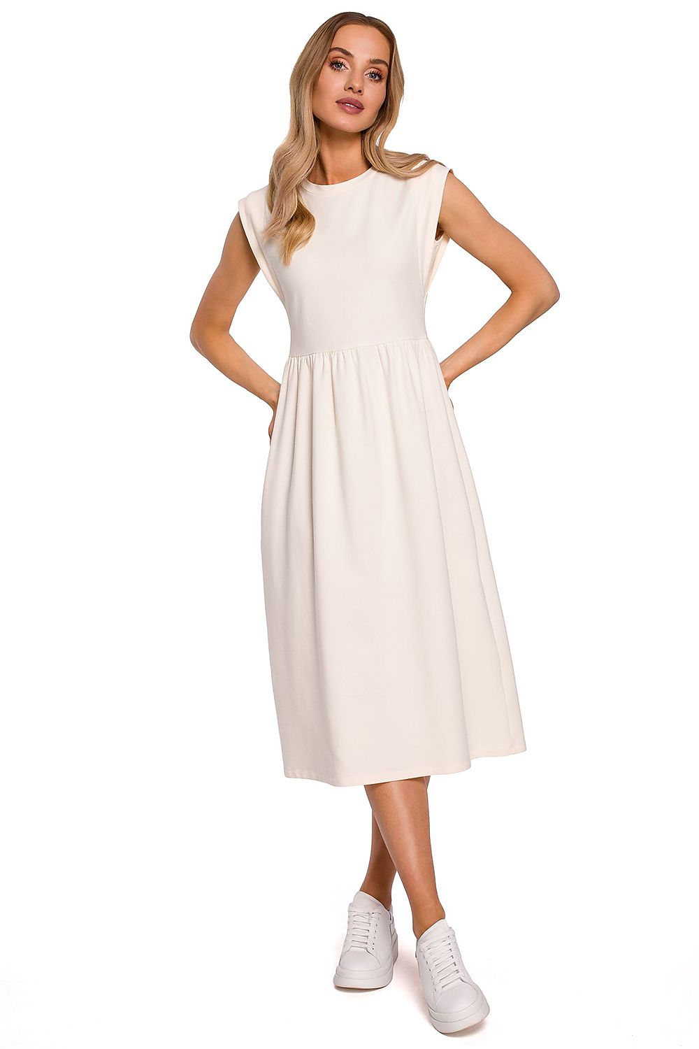 Moe Midi Length Knitted Dress With High Waist Cut And Loose Skirt, in a classic ivory tone, offering a timeless elegance and comfort for any setting.