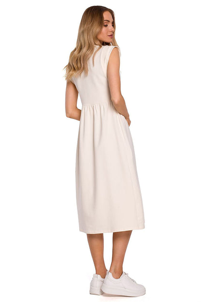 Elegant back view of Moe Midi Length Knitted Dress with High Waist Cut and Loose Skirt, exuding sophistication and versatility for any occasion.