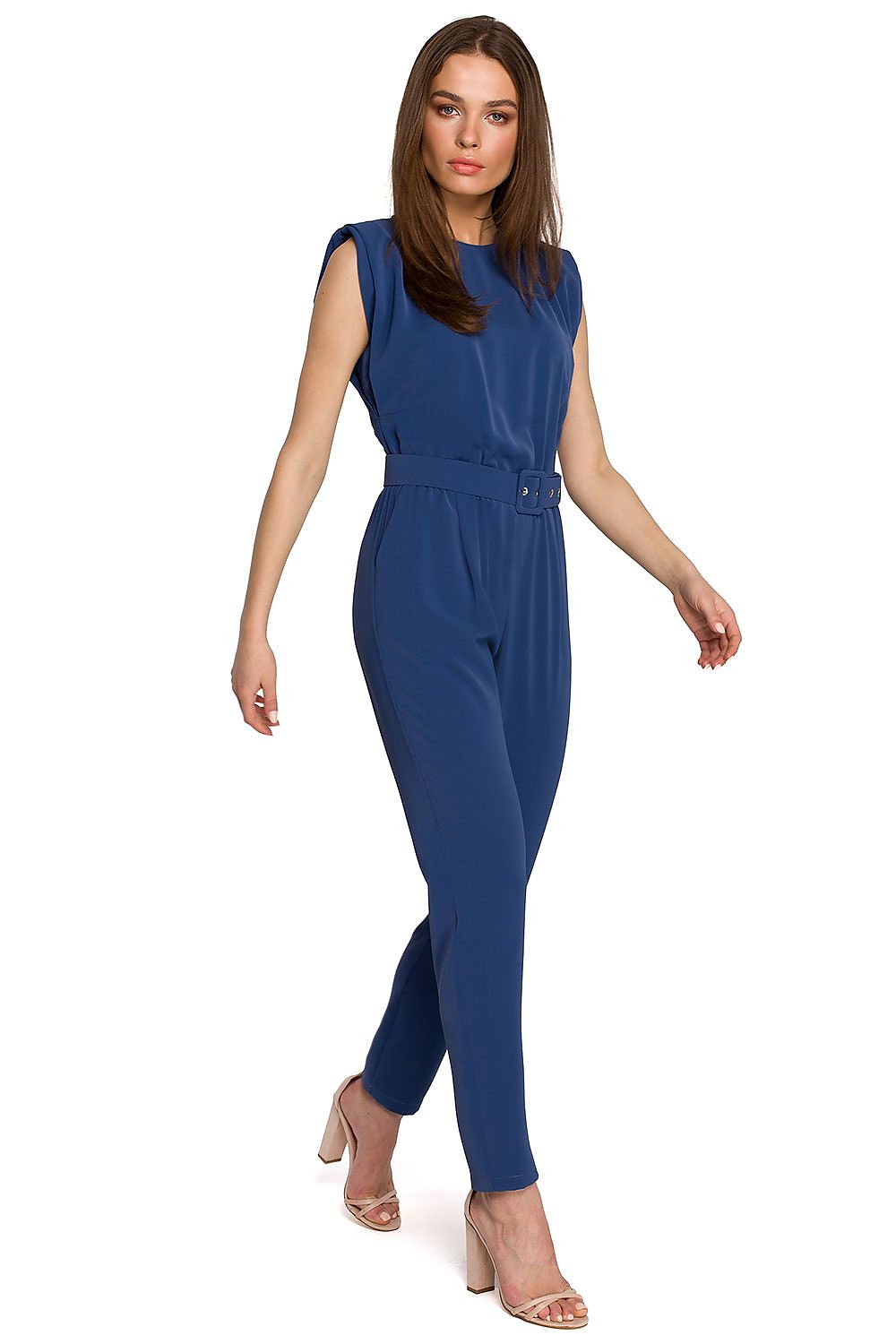 Chic blue Suit Stylove model, demonstrating a luxurious look with a sleek sleeveless design and a flattering belt.