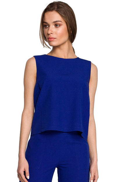 Stylove Blouse Stylove, a luxurious short sleeveless blouse in a captivating royal blue hue, featuring a trapeze cut and a delicate neckline at the back.