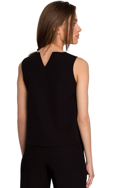 Back view of the stylish black sleeveless blouse by Stylove, showcasing a delicate neckline and sophisticated design details.