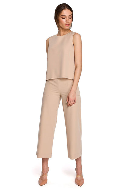 Full view of the elegant beige sleeveless blouse by Stylove, expertly tailored for a fashionable and contemporary appearance.