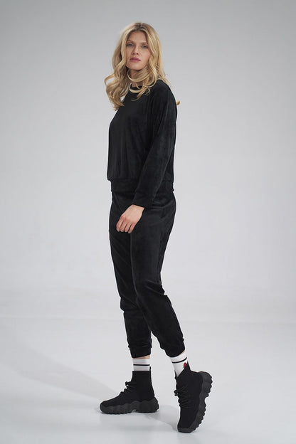 Elegant black velour tracksuit trousers by Figl, showcasing a stylish silhouette, ideal for chic leisurewear.
