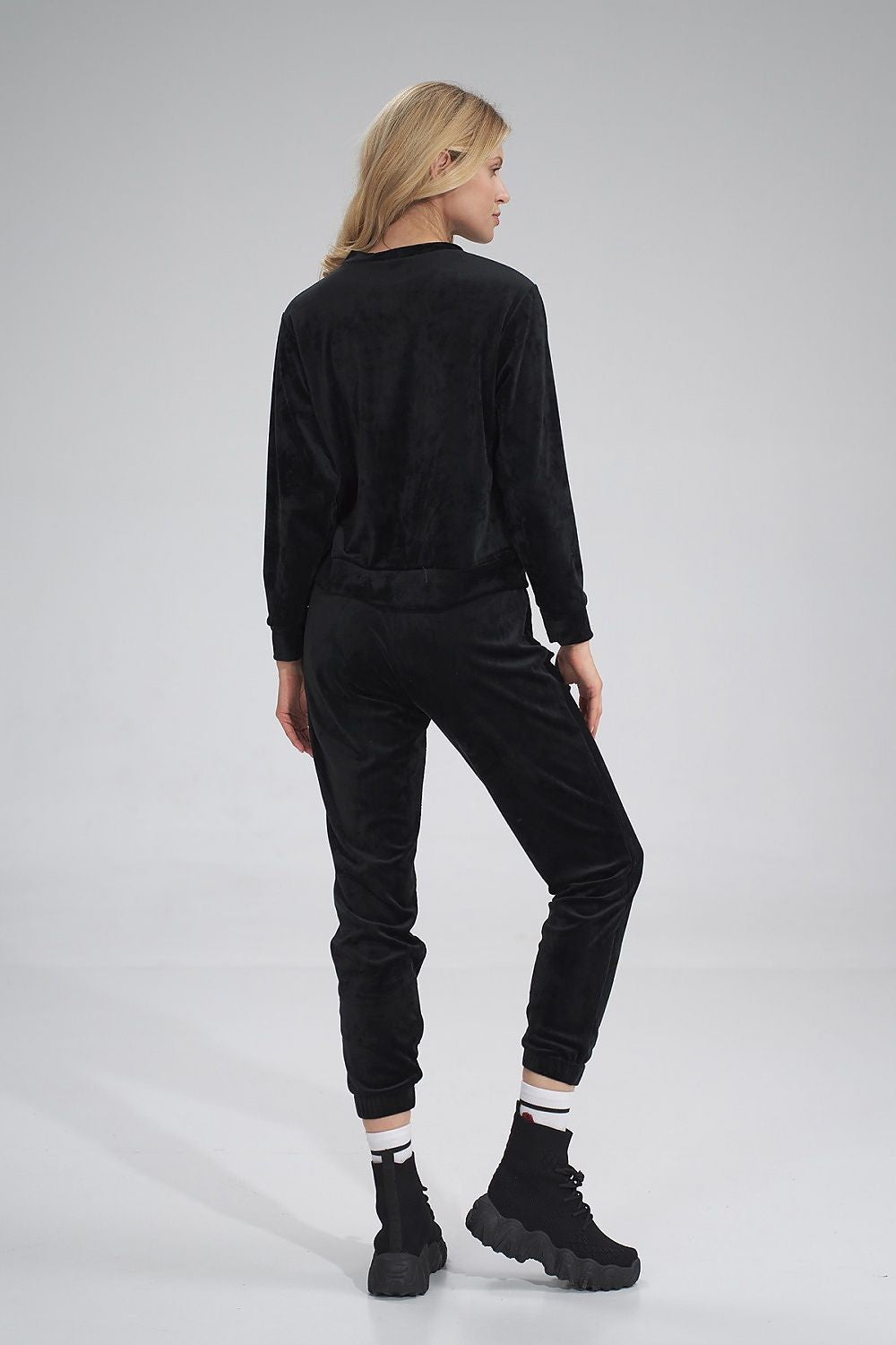 Refined black velour tracksuit trousers by Figl, designed for understated elegance and ultimate comfort.