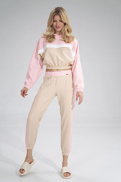 Stylish Figl tracksuit trousers showcasing a modern design with a sporty aesthetic, featuring a wide elastic waistband and tapered cuffs, perfect for an elegant active lifestyle.