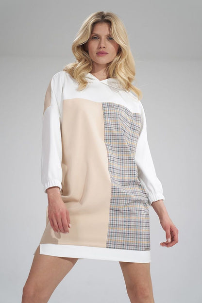 Striking front pose in the Daydress Figl, blending contemporary style with comfort, a must-have for luxury fashion enthusiasts.