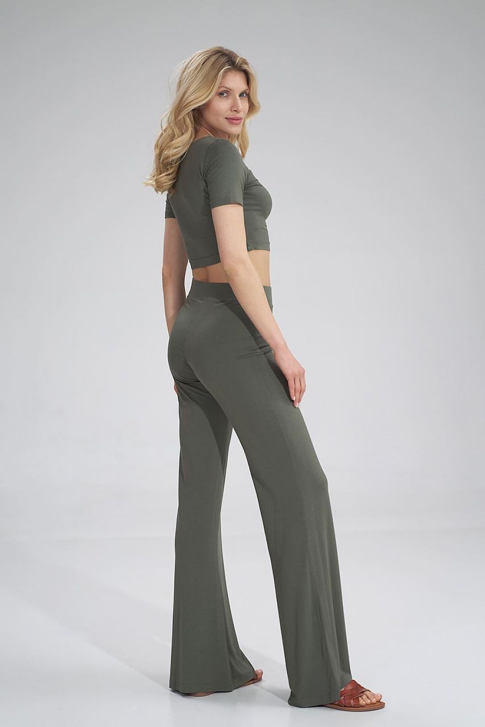 Graceful olive Figl cropped blouse paired with flowing trousers, perfect for a luxurious and fashionable look.