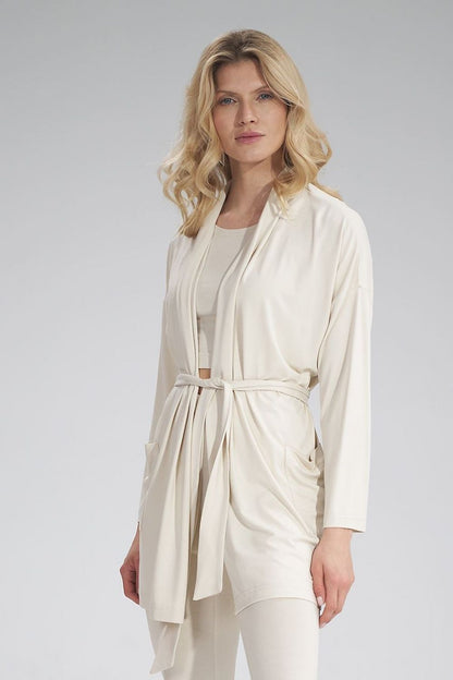 Sophisticated front view of a cream sweatshirt by Figl, featuring a chic belted design and large pockets, ideal for high-end casual occasions.