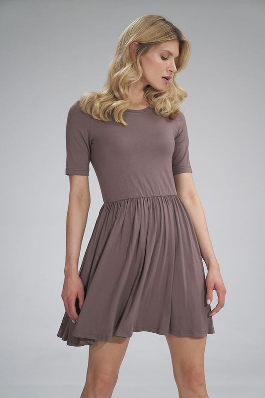 Elegant Daydress by Figl, a luxurious summer sports dress featuring short sleeves, gathered waist with an elastic band, and half-round neckline, perfectly flared at the bottom, ideal for a sophisticated yet casual look.