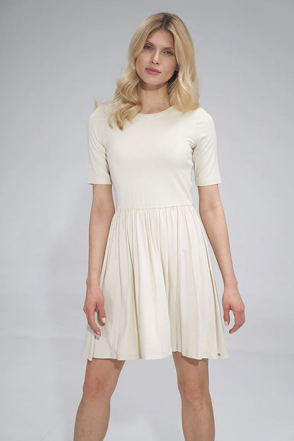 Chic Daydress Figl showcasing a flattering flared skirt and half-round neckline, ideal for casual sophistication.