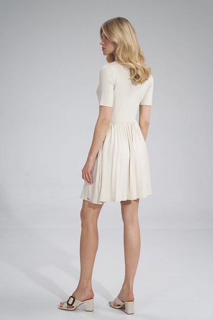 Stylish Daydress Figl presented from the back, highlighting its soft fabric and graceful silhouette, a quintessential piece for summer style.