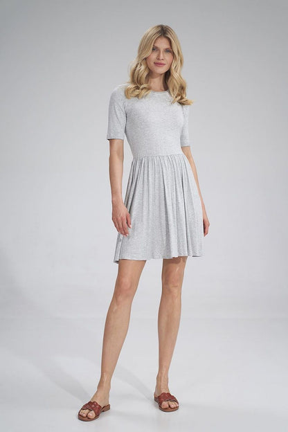 Chic grey summer sports dress by Figl, showcasing a flattering silhouette with short sleeves and flowing skirt, ideal for warm weather.