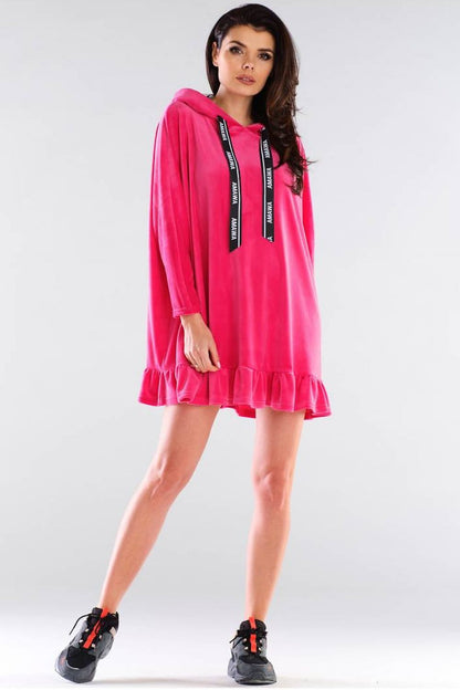 Chic pink Daydress by Awama with a sophisticated hood and logo details, showcasing a trendy frill hem, ideal for a luxurious yet relaxed style.