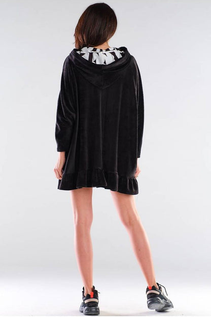 Back view of the exquisite Awama daydress, highlighting the plush fabric, stylish hood, and delicate frill detail, embodying a blend of comfort and sophistication.