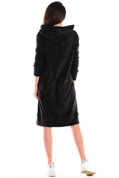 Back view of the luxurious velour daydress by Awama, showcasing its stylish hood and flattering midi length, ideal for chic casual wear.