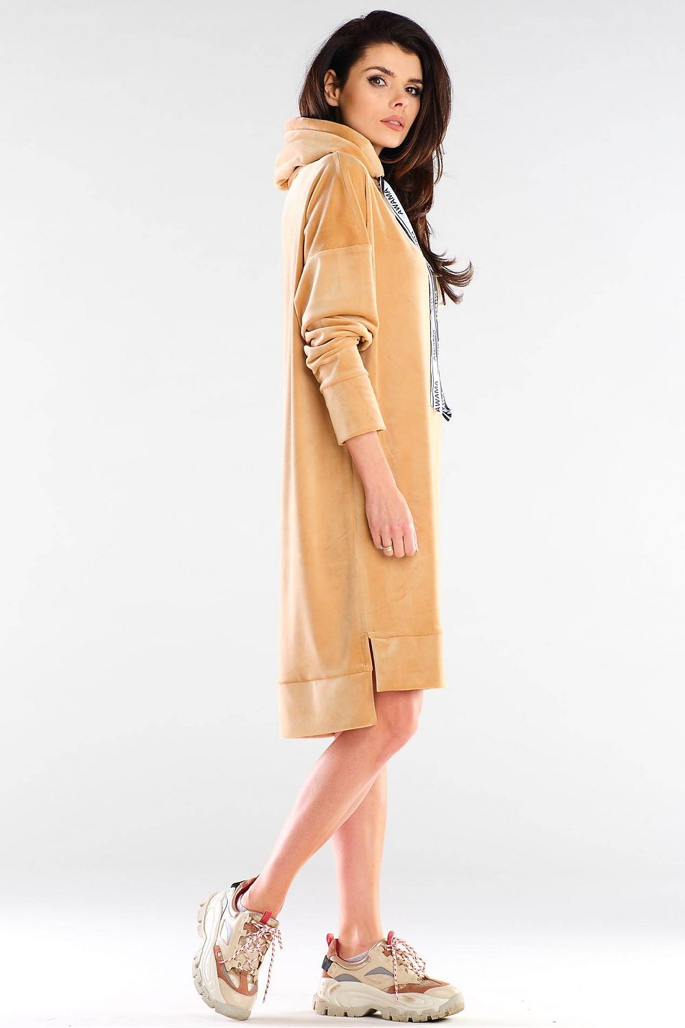 Side view of the chic Daydress by awama, highlighting the modern design with side slits and a fashionable hood.