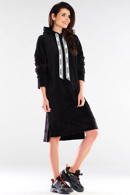 Chic black hooded daydress from Awama, designed for a sporty yet sophisticated look, ideal for casual spring wear.