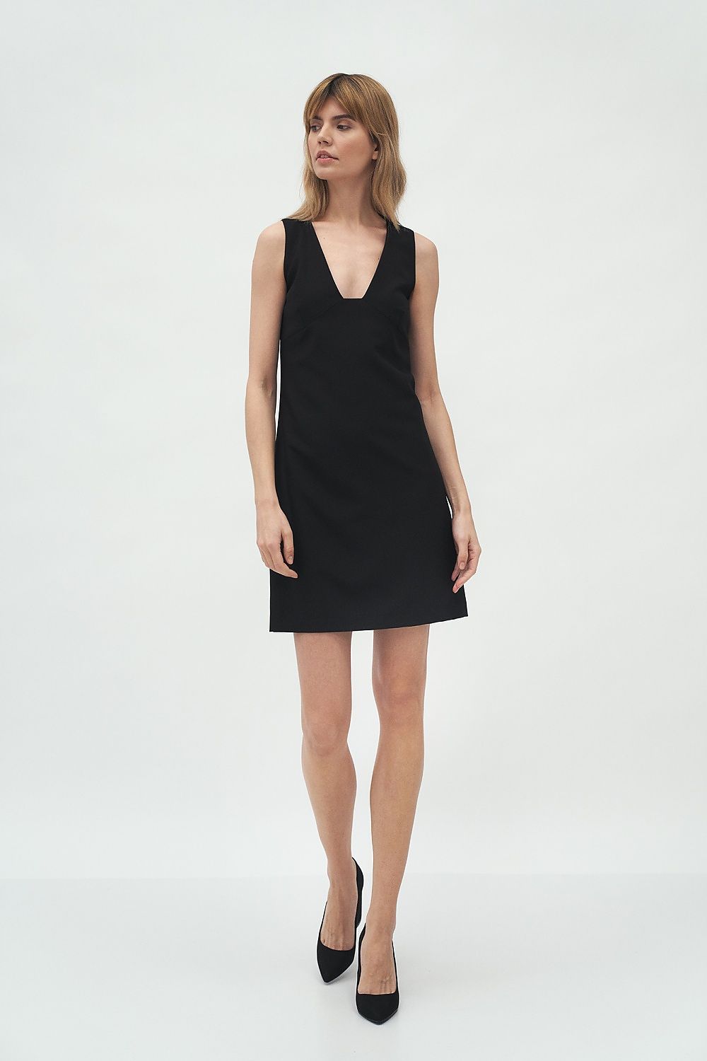 Luxurious Nife daydress in a soft office style, beautifully designed to enhance feminine elegance for a chic event.