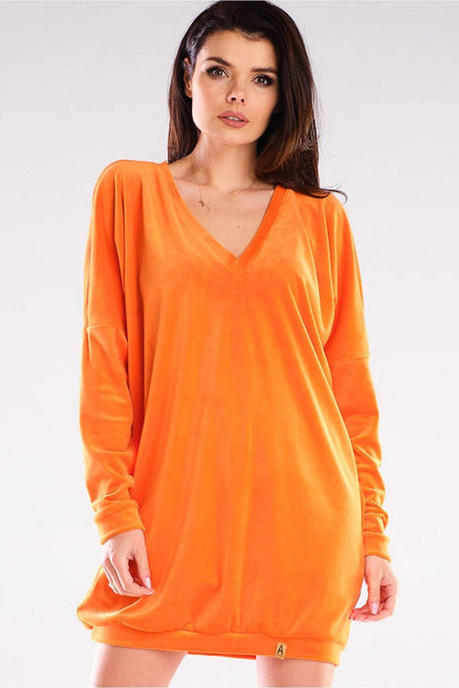 Vibrant orange Awama velour daydress featuring a heart neckline and long sleeves, a chic choice for warmer seasons.