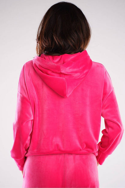 Back view of a luxury pink velour hooded kangaroo sweatshirt from Awama, showcasing the soft fabric and classic loose fit.