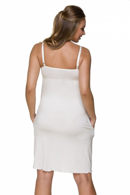 Tranquil back view of the Lupo Line women's nightshirt, designed for pregnancy and breastfeeding, featuring a slim fit and luxurious ecru viscose fabric.