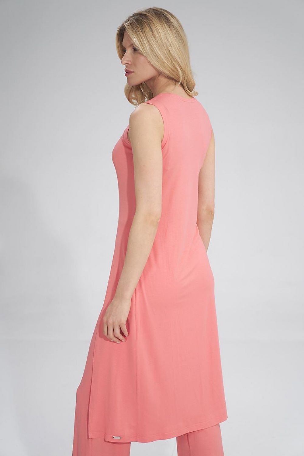Back view of the coral midi tunic dress by Figl, highlighting its sleek design and luxurious fabric.