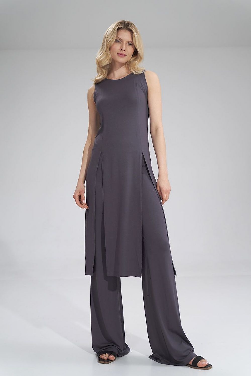 Elegant sleeveless midi tunic dress with decorative slits by Figl, displayed front view, offering a stylish summer look in a luxurious shade.