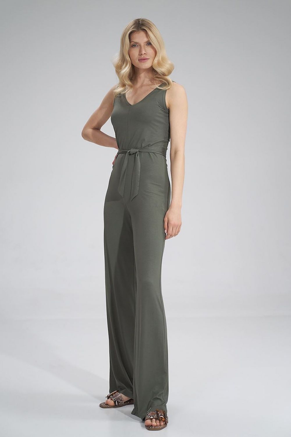 Gorgeous Figl sleeveless jumpsuit in rich olive green, designed with a sweetheart neckline and waist tie, offering a luxurious summer style with flowing wide legs.