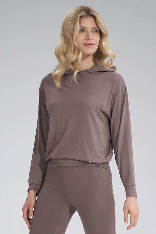 Elegant female model showcasing the Luxurious Thin Viscose Hooded Sweatshirt by Figl, featuring long sleeves and a relaxed fit, perfect for a sophisticated casual look.