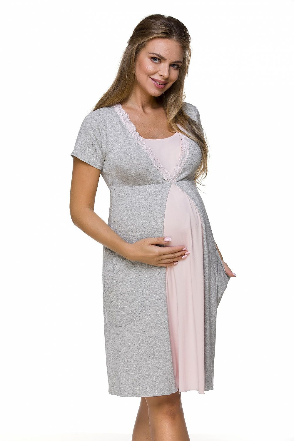 Luxurious Lupo Line Maternity Nightshirt featuring a short sleeve design in soft pastel colours. The shirt includes convenient breastfeeding access and elegantly fits the pregnant silhouette, accentuated by pleats under the bust. Ideal for comfort and style during pregnancy.