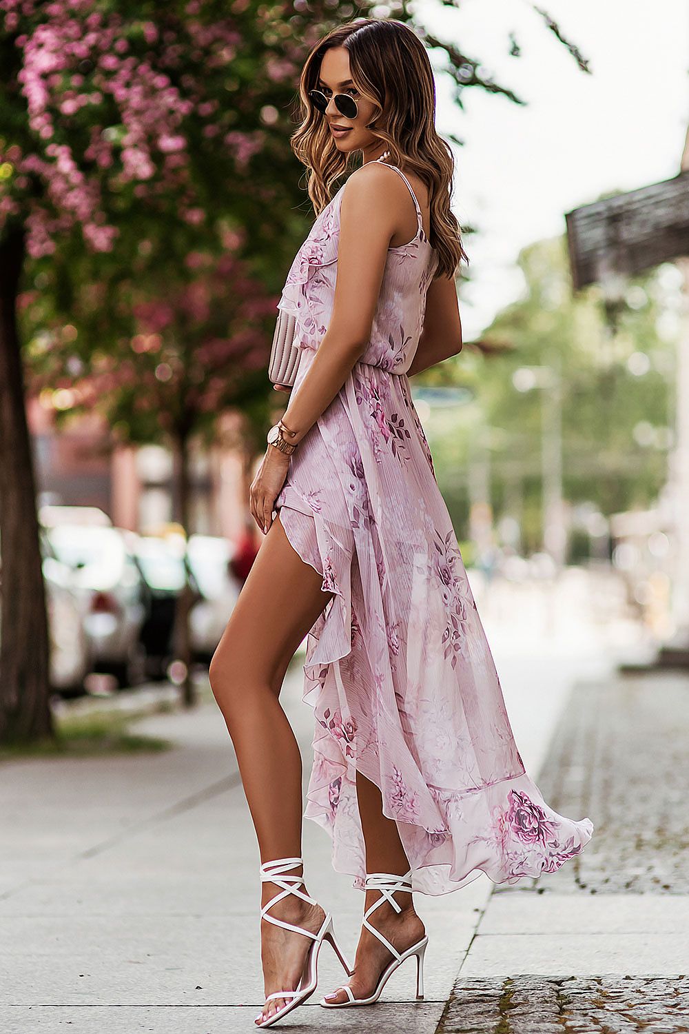 Elegant Floral Chiffon Daydress with Frills by IVON showcased on a model wearing it stylishly on a city street, complemented with stiletto heels and sunglasses, perfect for romantic outings.