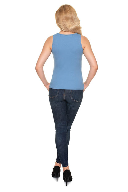 Back view of a model wearing a luxury fitted blouse with heart neckline in high-quality ribbed cotton by PeeKaBoo, complemented with dark jeans.