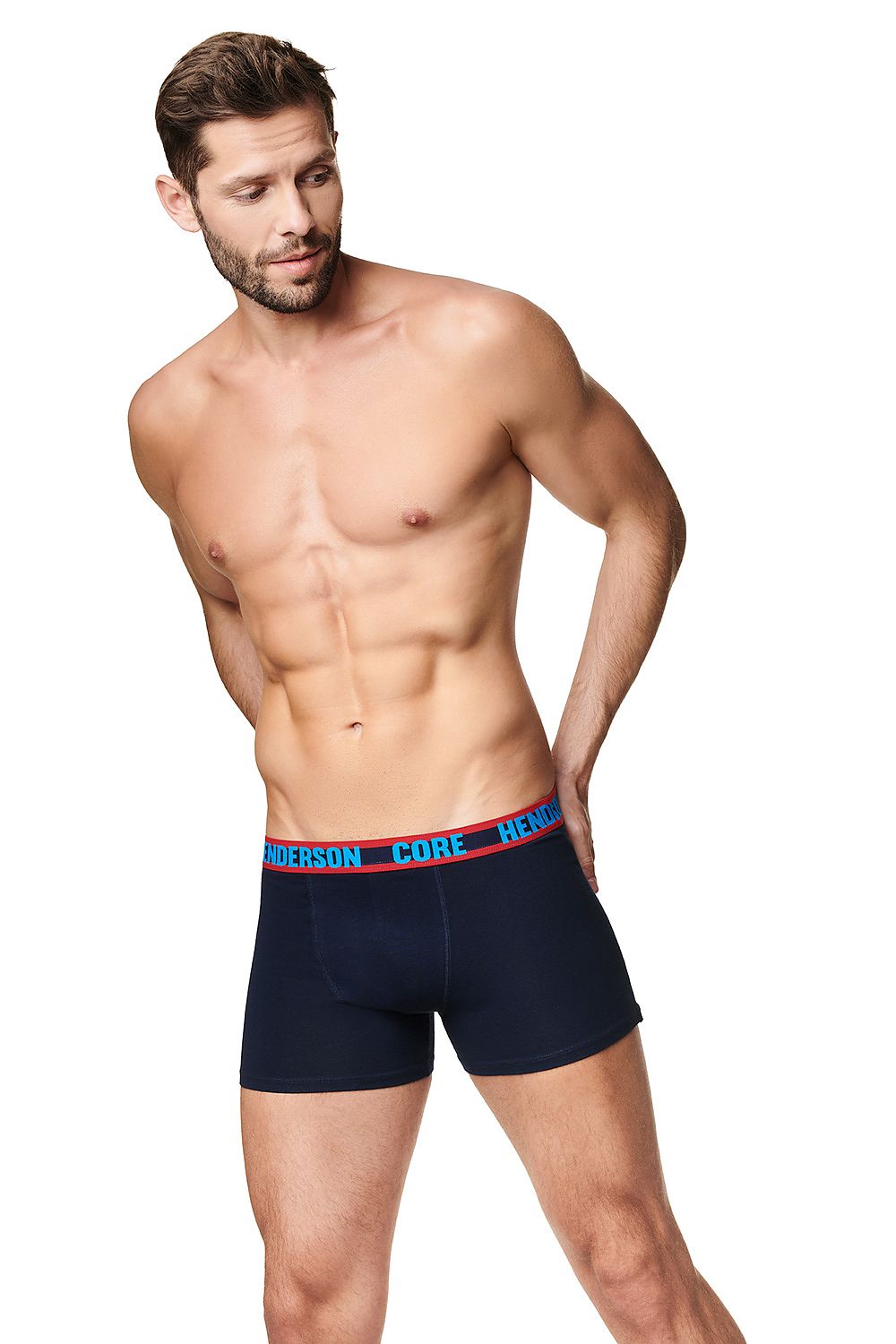 Luxurious Henderson Men's Boxers 2-Pack with Striking Printed Elastic Waistband displayed on a model, showcasing the elegant cotton knitwear in a classic navy colour.