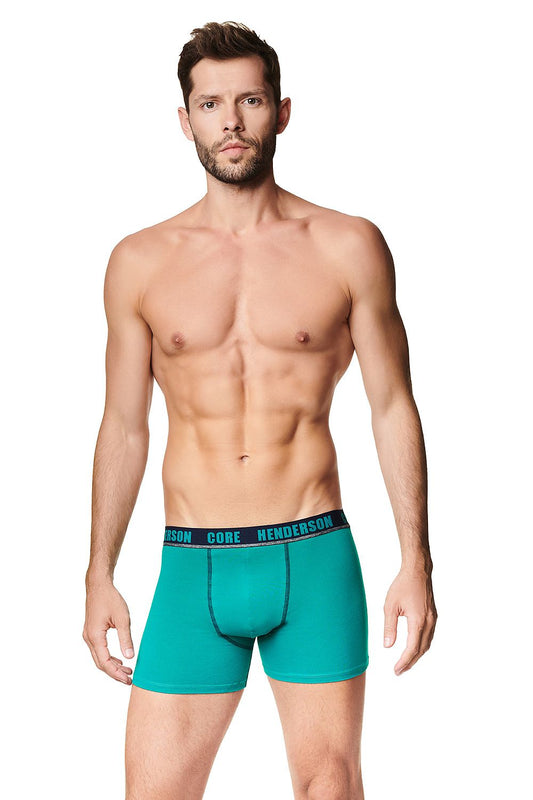 Luxury Men's 2-Pack Henderson Boxer Shorts in Green - Soft Cotton with Stylish Contrasting Piping, model displaying elegance and comfort in a vibrant colour.