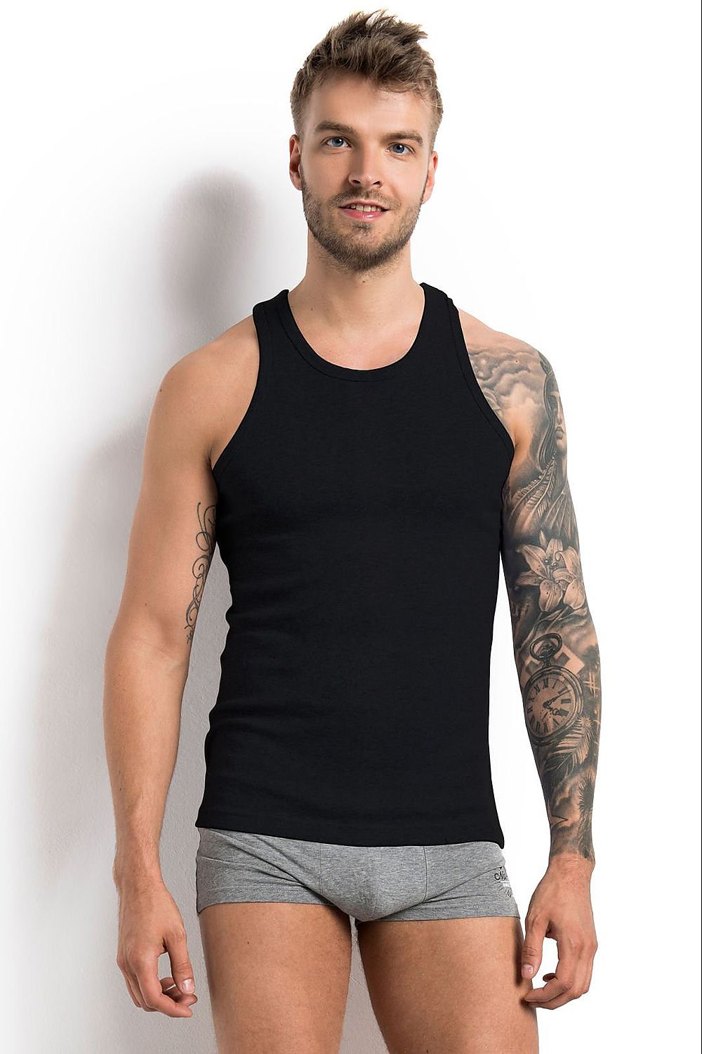 Henderson Men's Classic Black Wide-Strap Singlet T-Shirt - Body Fit Cotton Comfort featuring a fitted body design, worn by a male model, showcasing a stylish look in black.