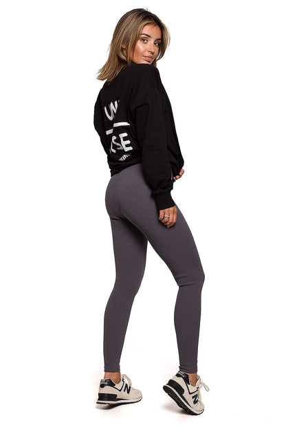 Luxurious BeWear Striped Leggings in grey styled with a black statement hoodie, capturing a trendy and comfortable ensemble.