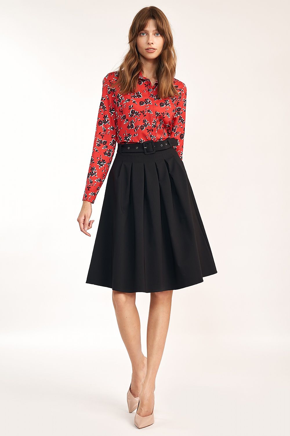Elegant A-Line Skirt With Belt and Pleats For Office & Casual Occasions By Nife, captured on a model wearing a vibrant red floral shirt that complements the refined black skirt.